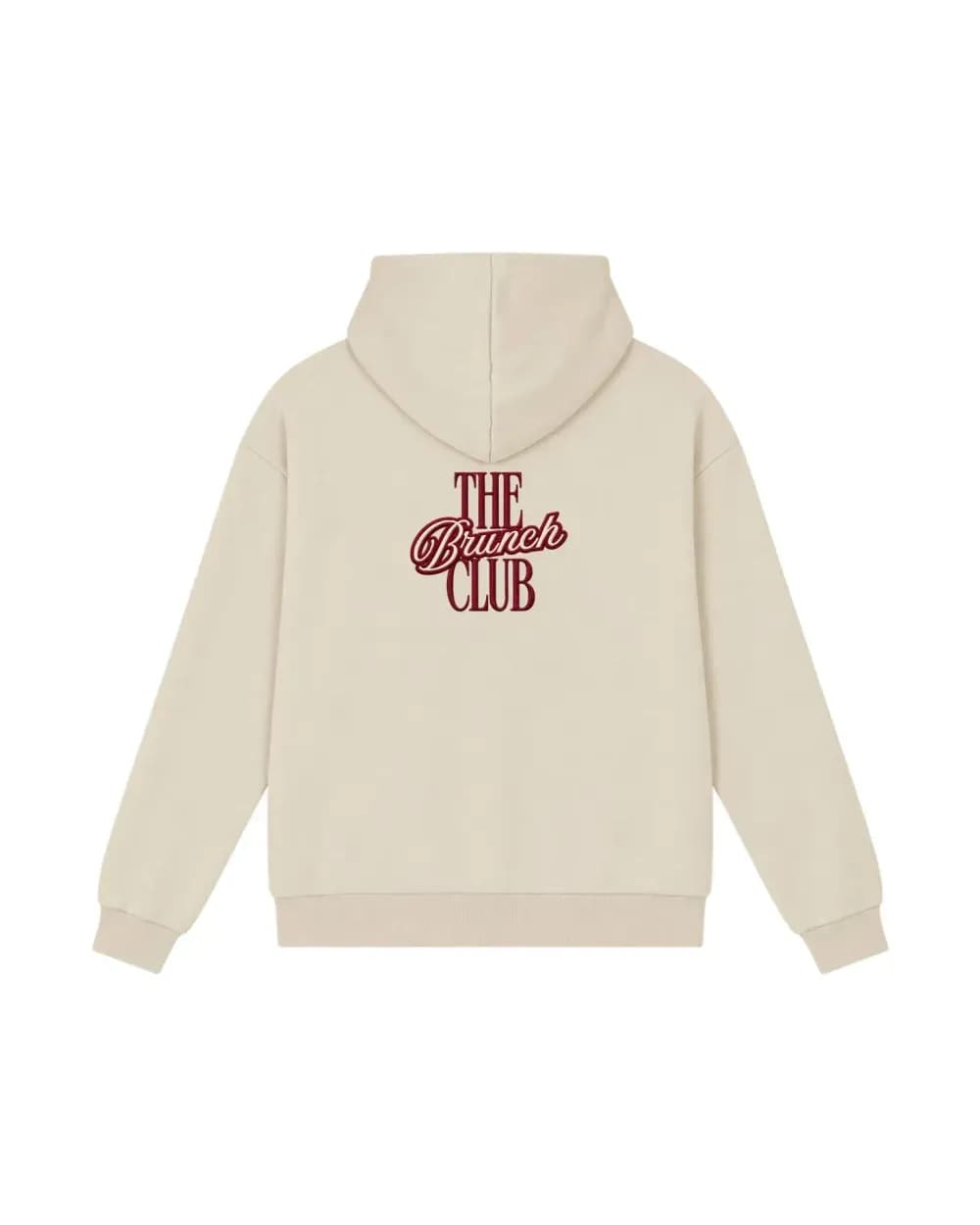 Broderie en relief dont le fil accroche la lumière dans le dos d’un hoodie